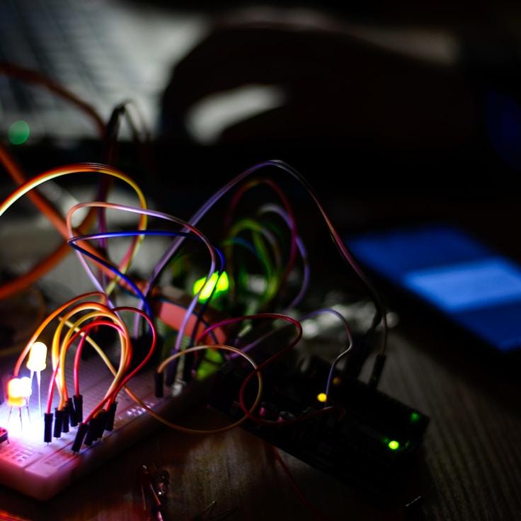 Mobile app project planning workspace with devices and development tools